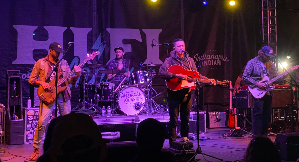 A 4-piece band playing a live concert